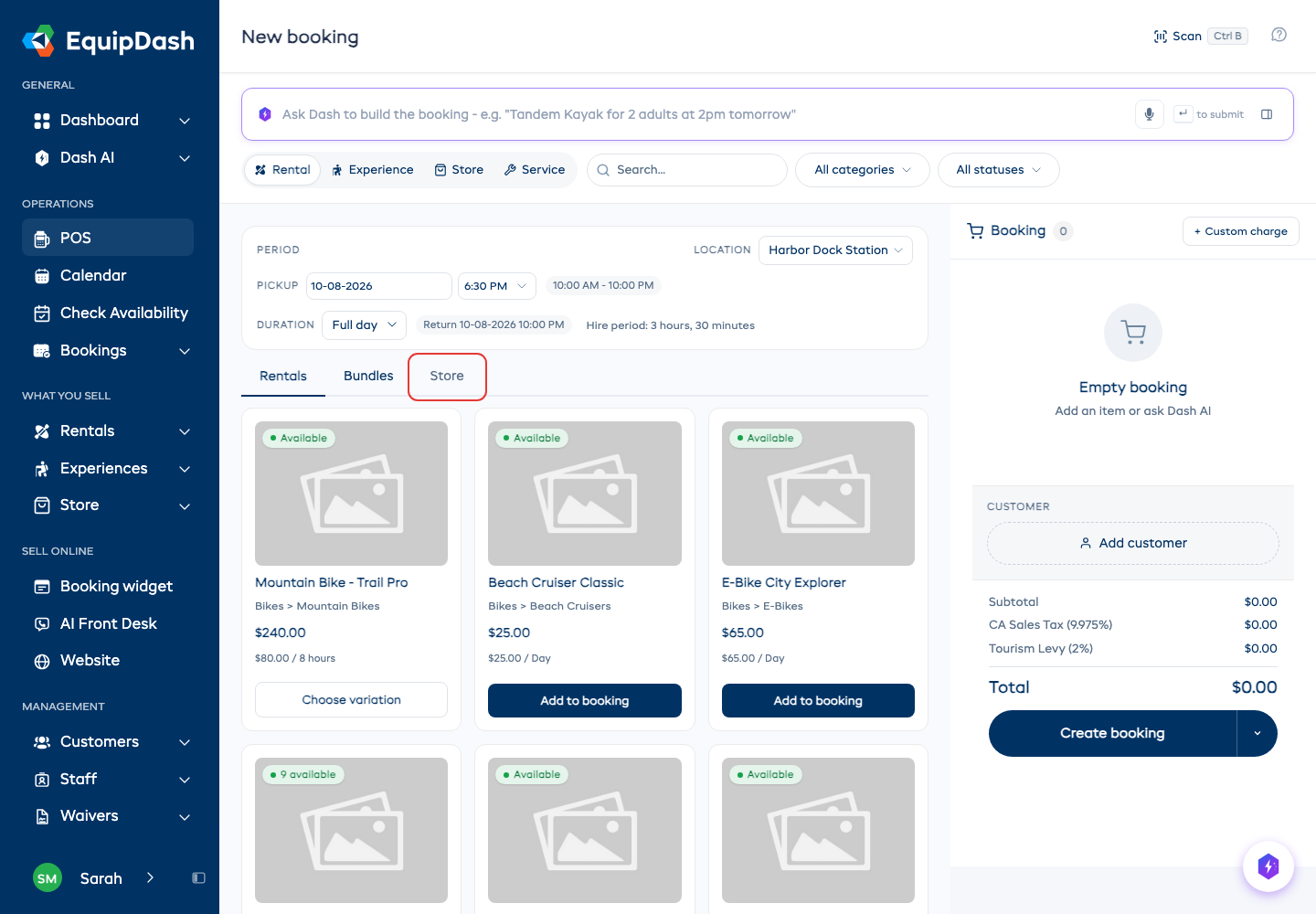 The Rental view showing the booking-type pills, search and filters, the period / date / time / location strip, the Rentals / Bundles / Store sub-tabs, and a grid of product cards. The Store sub-tab, which adds store products to the same sale, is outlined in red.