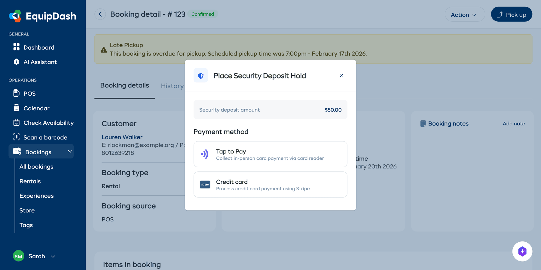 The Place Security Deposit Hold modal showing the deposit amount and payment method options.