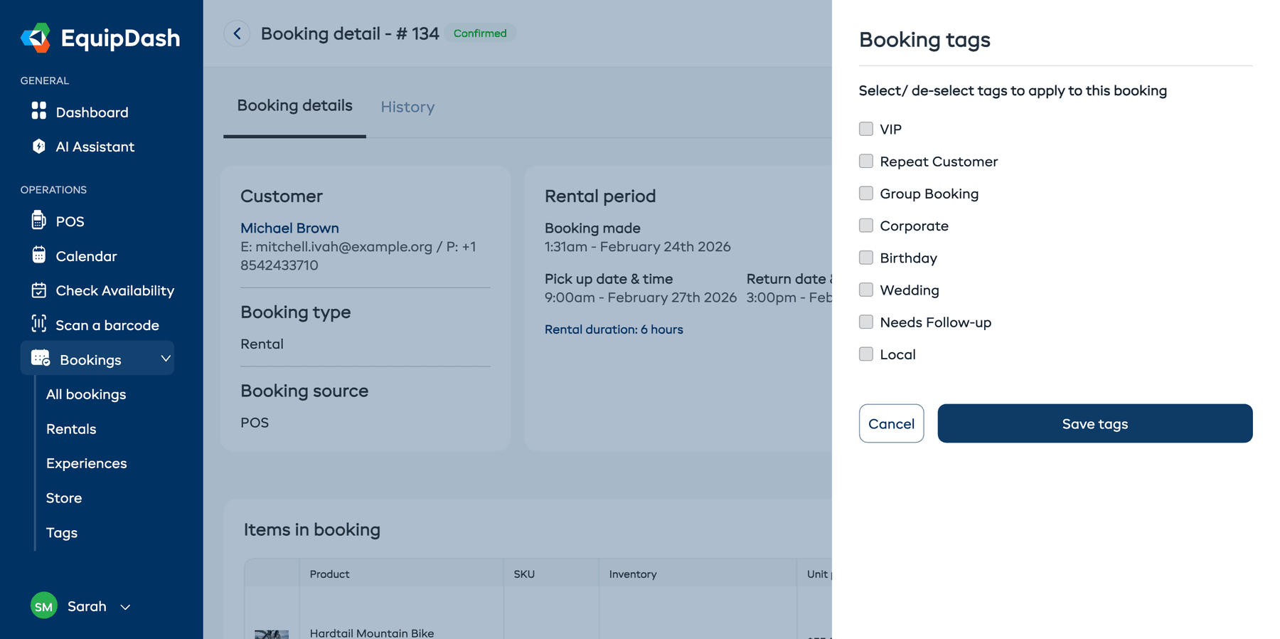 The Add Tags panel on a booking detail page with existing tags available to select.