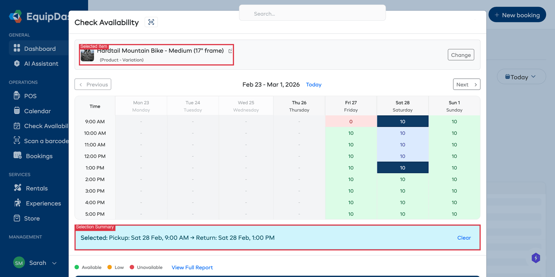 The availability grid with a product selected, pickup and return times highlighted, and the selection summary bar