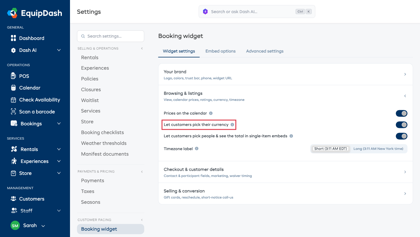 The "Let customers pick their currency" toggle switched on in Settings → Booking widget.