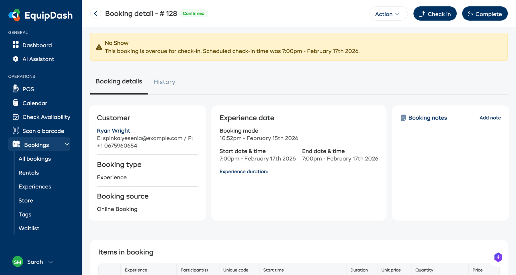 An experience booking detail page showing the Check in and Complete buttons in the top-right corner.