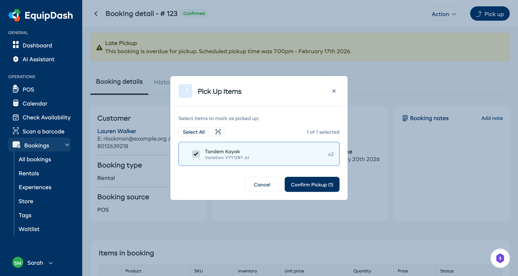 The pickup modal with a list of booking items, checkboxes next to each, and a Confirm Pickup button at the bottom.