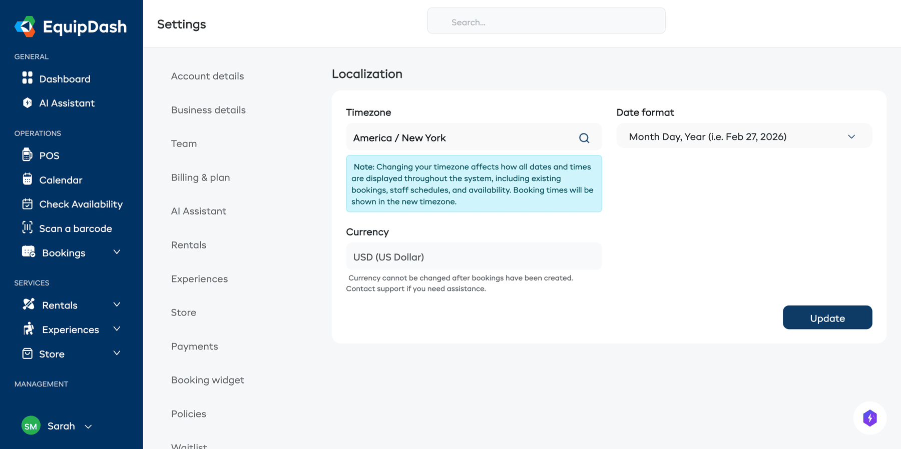 The Localization settings page with timezone, currency, and date format dropdowns