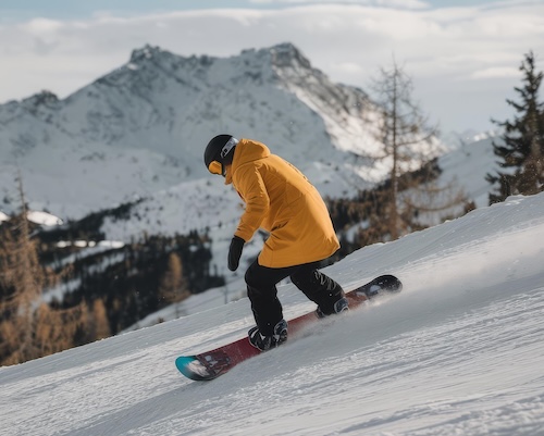 Snowboarding down a mountain