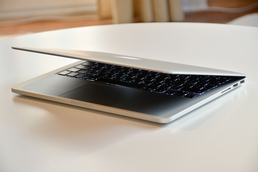 Laptops and IT equipment being prepared for a conference deployment