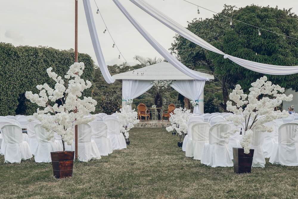 Wedding tables being dressed and styled ahead of a reception